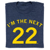 Blue RAYGUN T-shirt with the text IM THE NEXT 22 in yellow lettering.