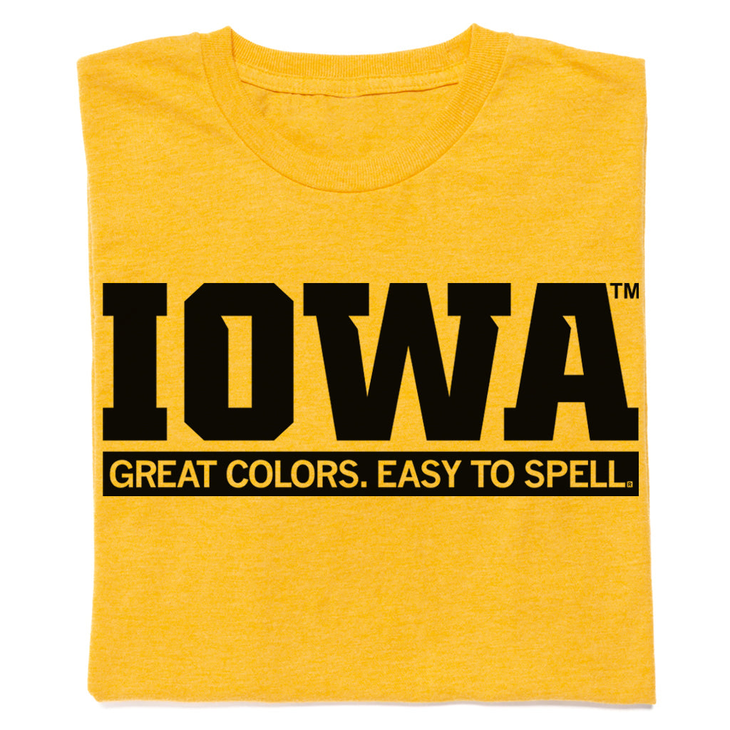 Heather yellow RAYGUN apparel t-shirt with the black text IOWA and the phrase GREAT COLORS. EASY TO SPELL. printed below it.