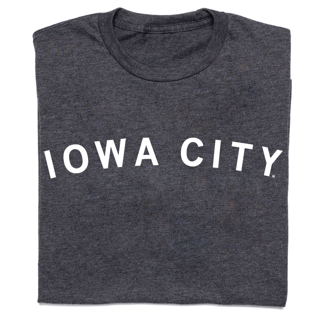 Charcoal gray RAYGUN T-shirt with IOWA CITY printed in white capital letters across the chest.