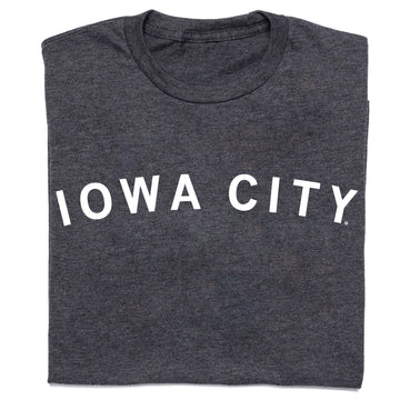 Charcoal gray RAYGUN T-shirt with IOWA CITY printed in white capital letters across the chest.