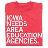 A red, union-made t-shirt with the white text IOWA NEEDS AREA EDUCATION AGENCIES.