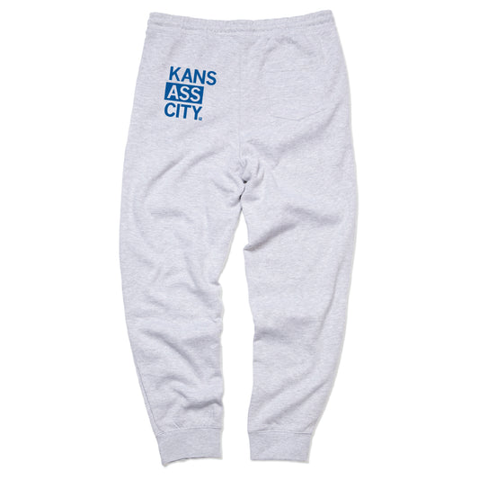 Heather grey sweatpants with KANS ASS CITY printed in blue on the back.