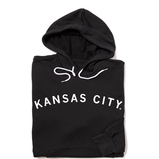 Black union-made pullover hoodie featuring KANSAS CITY printed in white on the front.