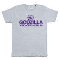 Heather grey t-shirt with purple ink that says, "Godzilla King of Kindness" with Godzilla's head emerging above the text.