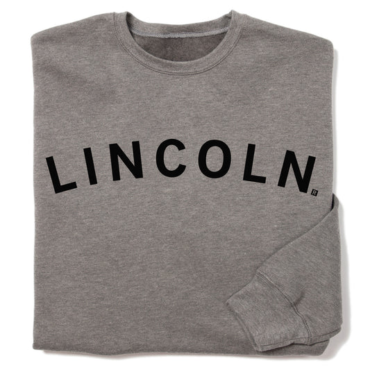 Grey union-made crew sweatshirt with the word LINCOLN printed in black across the chest.