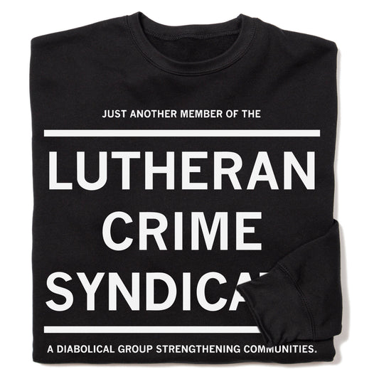 Black Lutheran Crime Syndicate crew sweatshirt featuring the white text: JUST ANOTHER MEMBER OF THE LUTHERAN CRIME SYNDICATE A DIABOLICAL GROUP STRENGTHENING COMMUNITIES.