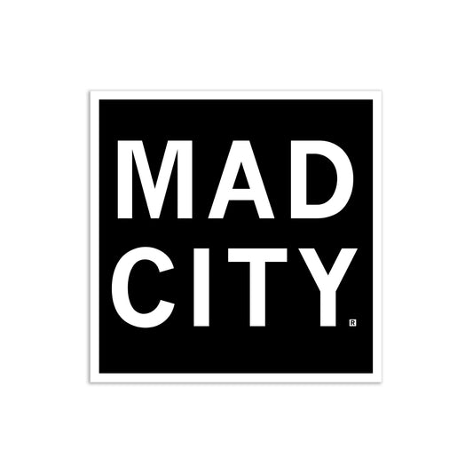 A black RAYGUN vinyl sticker featuring the white text MAD CITY with a registered trademark symbol.
