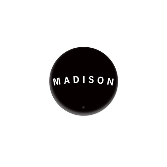 A black circular MADISON logo for the Madison, Wisconsin brand RAYGUN, featuring the text in white capital letters.