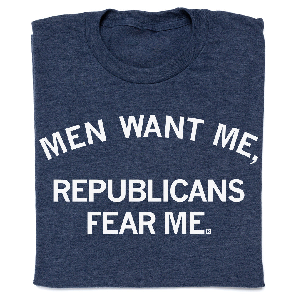 Heather denim T-shirt in navy blue featuring the white text, MEN WANT ME, REPUBLICANS FEAR ME.