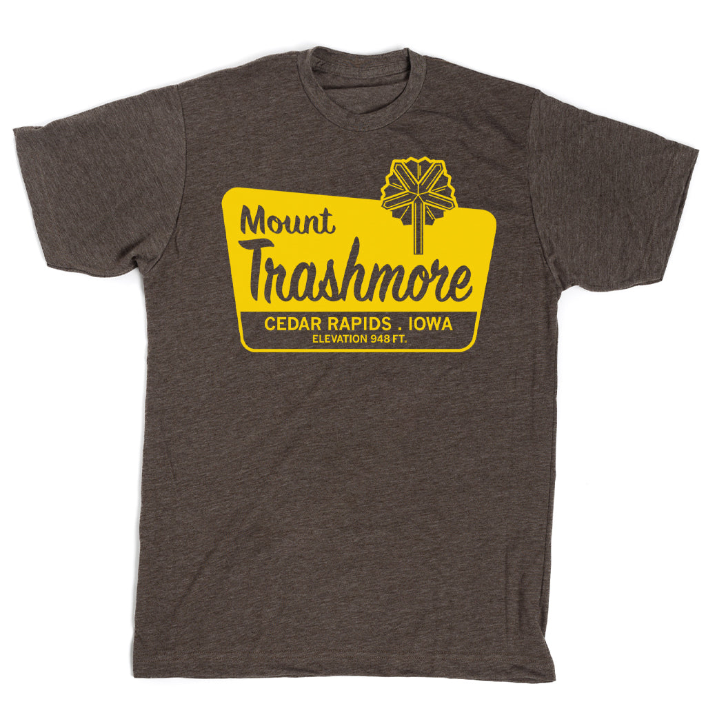Dark gray union-made t-shirt with a yellow graphic featuring a stylized tree and the text Mount Trashmore, Cedar Rapids, Iowa, Elevation 948 ft.