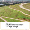 Aerial view of a winding dirt path on a grassy hill overlooking a Cedar Rapids city, with the text Pancake. Aint no Trashmore high enough on this union made shirt.