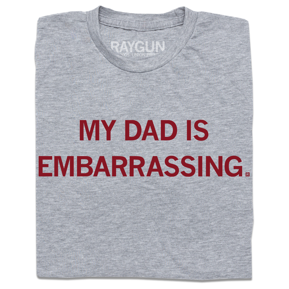 A folded heather grey t-shirt with cardinal ink that reads "My dad is embarrassing"