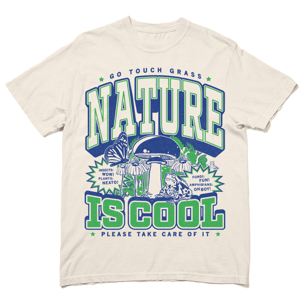 Heavyweight ivory t-shirt with a cream-colored graphic reading Go touch grass, Nature is cool, Please take care of it, featuring illustrations of a mushroom, a butterfly, a frog, and text bubbles about insects, plants, fungi, and amphibians.