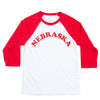 White union-made baseball-style shirt with red three-quarter sleeves and the word NEBRASKA printed in red across the chest.