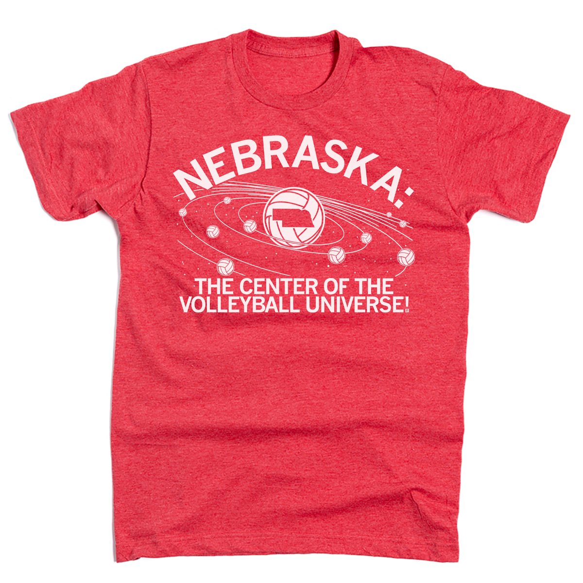 A heather red short-sleeve t-shirt with a white graphic print on the front. The graphic features the word 'NEBRASKA' arched over a volleyball orbit illustration with the text 'THE CENTER OF THE VOLLEYBALL UNIVERSE!' underneath.