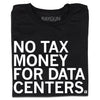 A folded black t-shirt with white ink text that reads "No tax money for data centers."
