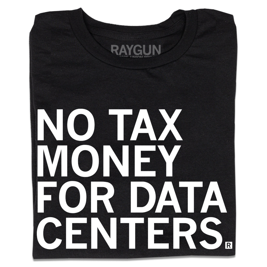 A folded black t-shirt with white ink text that reads "No tax money for data centers."