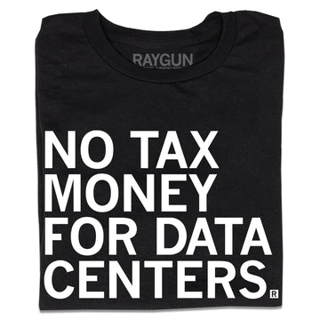 A folded black t-shirt with white ink text that reads "No tax money for data centers."