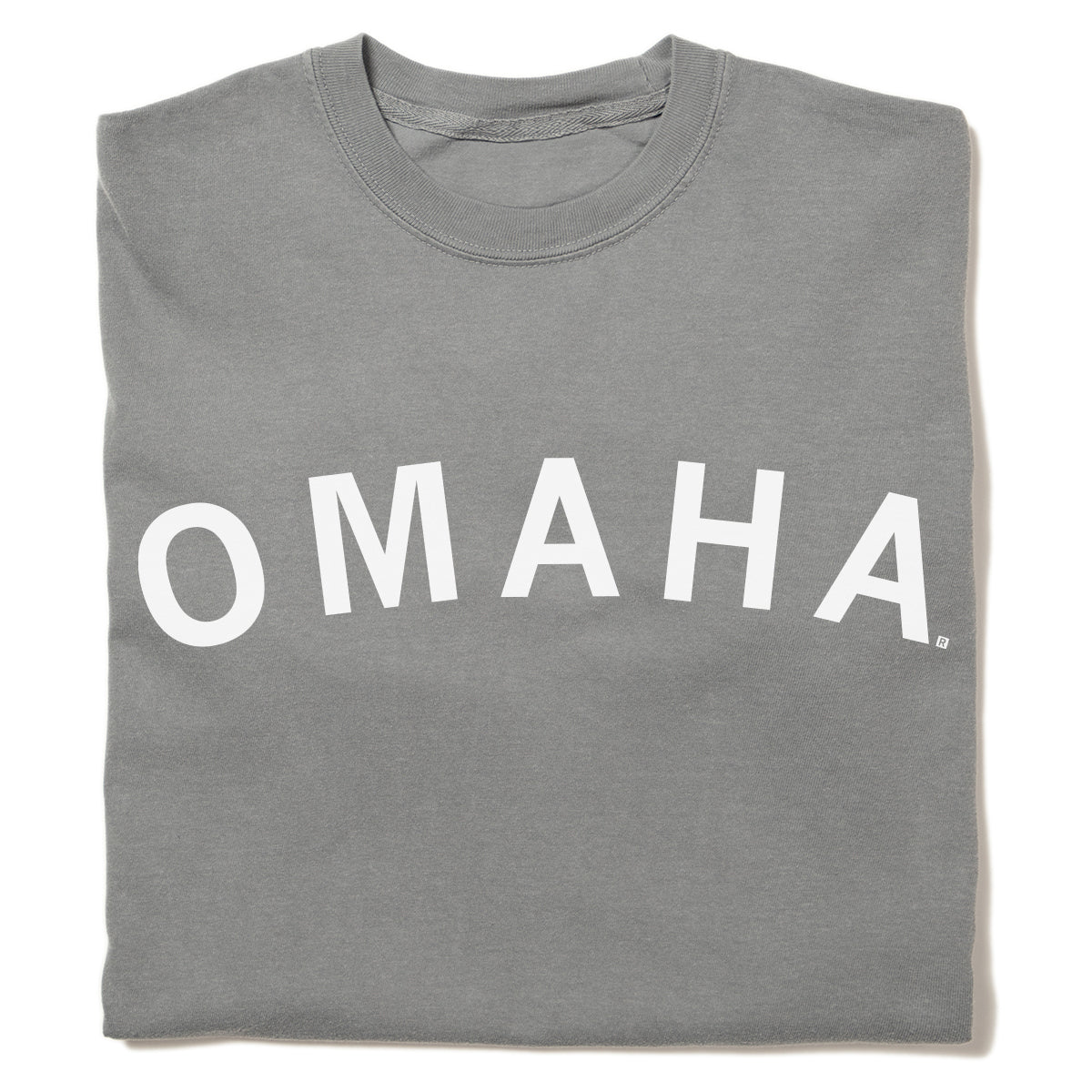 Folded gray heavyweight crewneck sweatshirt with the word OMAHA printed in white arching across the chest.