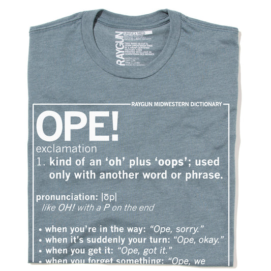 Indigo t-shirt featuring a Midwestern dictionary-style graphic for the word OPE!, complete with a definition and usage examples.