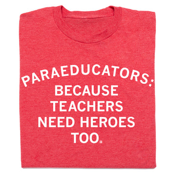Heather red crewneck t-shirt featuring the white text: PARAEDUCATORS: BECAUSE TEACHERS NEED HEROES TOO.