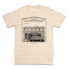Heavyweight ivory t-shirt featuring a black line drawing of the Paul’s Book Store storefront with the text MADISON 1954-2025 below it.