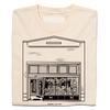 Heavyweight ivory t-shirt featuring a black line drawing of the Paul’s Book Store storefront with the text MADISON . 1954 - 2025 below.