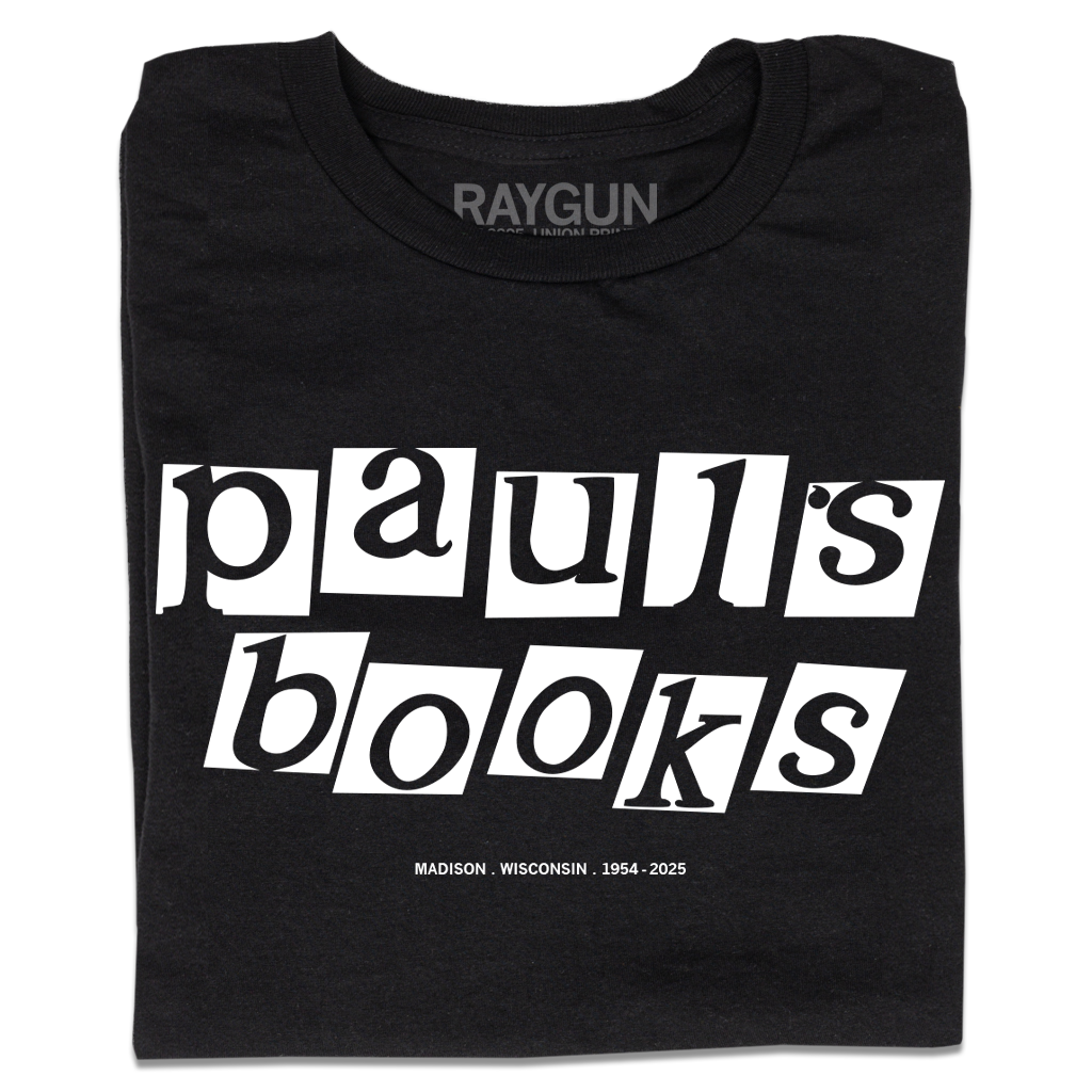 Black Paul’s bookstore t-shirt featuring the text pauls books in white block lettering with MADISON . WISCONSIN . 1954 - 2025 printed below.
