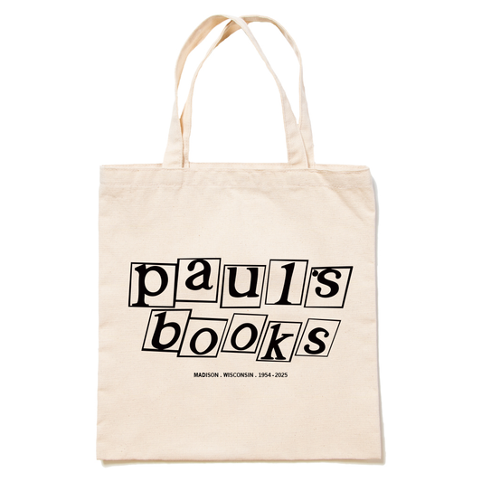 Off-white canvas tote bag featuring the text pauls books in black letters inside tilted square frames, with MADISON. WISCONSIN. 1954-2025 printed below as a Madison bookstore tribute.