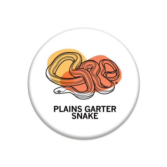 Round metal button featuring a black line drawing of a coiled Plains Garter Snake over yellow and orange shapes, with the text PLAINS GARTER SNAKE below.