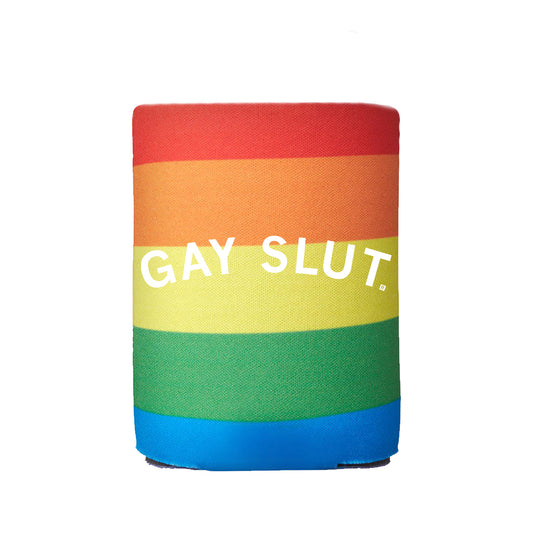 A rainbow-striped RAYGUN foam beverage cooler with the text GAY SLUT printed in white capital letters.