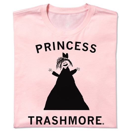 A light pink Princess Trashmore t-shirt featuring a black drawing of a figure in a dress and crown, with the text PRINCESS TRASHMORE printed above and below the graphic.