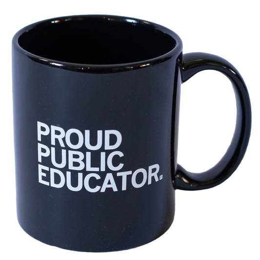Black dishwasher safe mug with the text PROUD PUBLIC EDUCATOR printed in white.