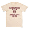 Light beige union made t-shirt with brown text that reads, I LIKE PUMPKIN SPICE & REPRODUCTIVE RIGHTS, centered above and below a graphic of a coffee cup with a pumpkin icon.