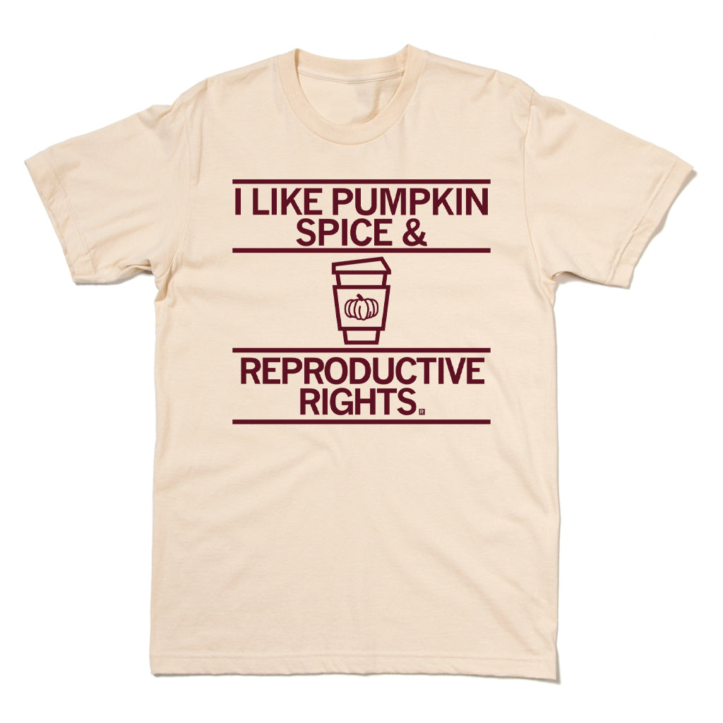 Light beige union made t-shirt with brown text that reads, I LIKE PUMPKIN SPICE & REPRODUCTIVE RIGHTS, centered above and below a graphic of a coffee cup with a pumpkin icon.