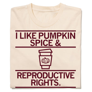 Cream-colored, union-made t-shirt featuring the text I LIKE PUMPKIN SPICE & REPRODUCTIVE RIGHTS surrounding a coffee cup icon with a pumpkin graphic.