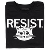 Black screen print t-shirt featuring the white text RESIST above a graphic of a cat’s face.