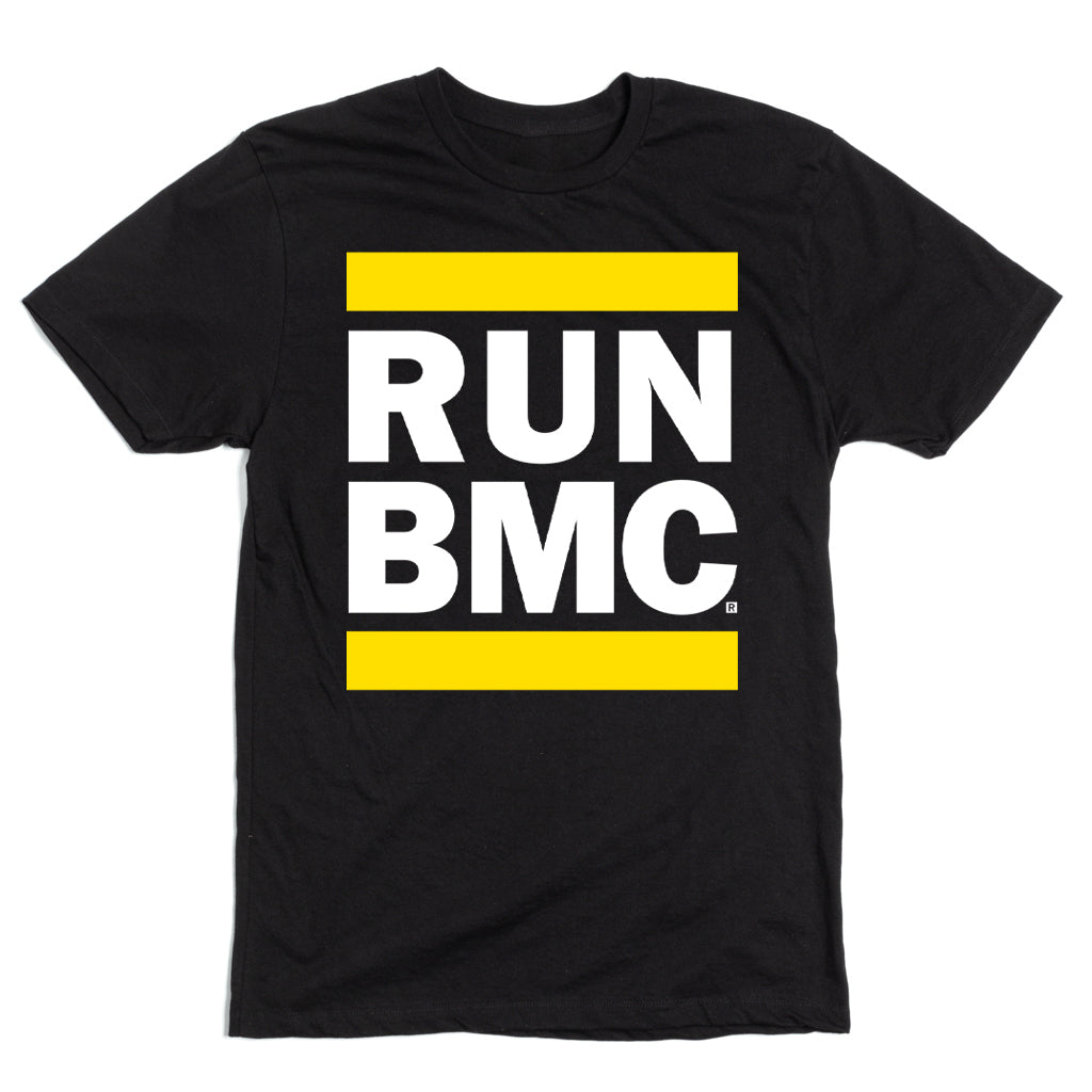 Black ringspun cotton short-sleeve t-shirt with a yellow square containing the white text RUN BMC.