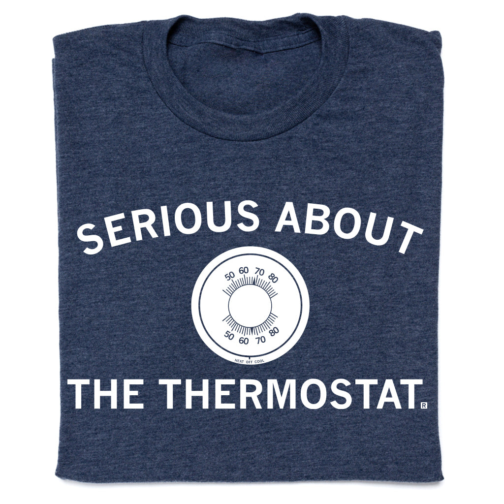 Heather denim navy blue t-shirt featuring a circular thermostat dial graphic in the center with the text SERIOUS ABOUT THE THERMOSTAT.