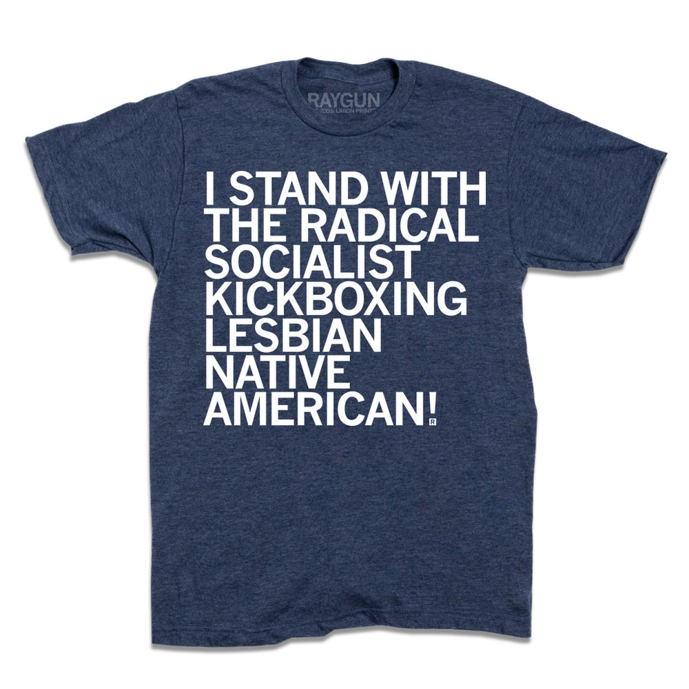 Heather navy t-shirt with left-aligned white ink text that reads "I stand with the radical socialist kickboxing lesbian Native American!"