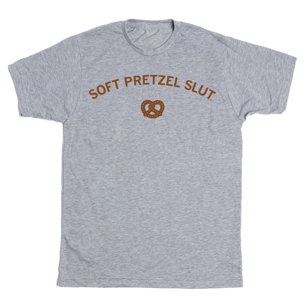 Heather grey crewneck t-shirt with the text SOFT PRETZEL SLUT in brown lettering above a brown pretzel icon.