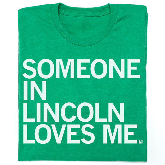 Green RAYGUN t-shirt with the white text SOMEONE IN LINCOLN LOVES ME.