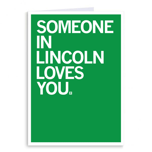 A RAYGUN greeting card with a green background and the white text: SOMEONE IN LINCOLN LOVES YOU.