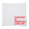 White flour sack towel with the red text SOMEONE IN NEBRASKA LOVES ME.