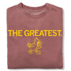 Dusty rose RAYGUN sweatshirt with the words THE GREATEST and a gold screen print of a yellow cartoon bird mascot on the front.