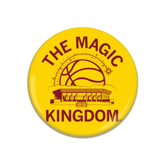 Yellow circular Magic Kingdom pin featuring a basketball, a building, and the text THE MAGIC KINGDOM.