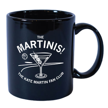 Black ceramic Kate Martin mug featuring white text that reads The Martinis! The Kate Martin Fan Club with a graphic of a martini glass containing basketballs.