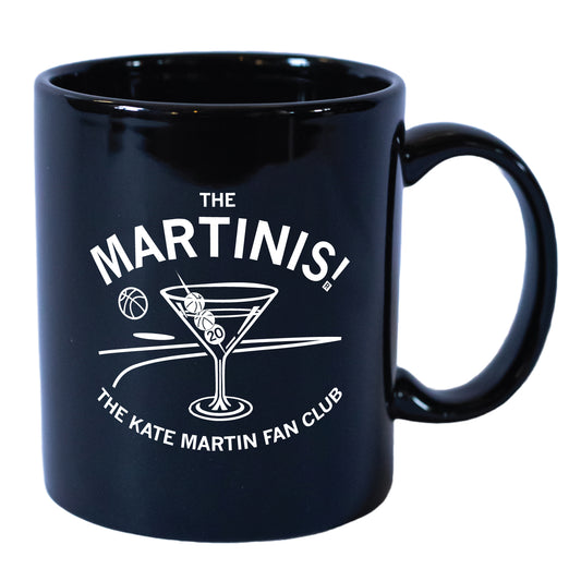 Black ceramic Kate Martin mug featuring white text that reads The Martinis! The Kate Martin Fan Club with a graphic of a martini glass containing basketballs.