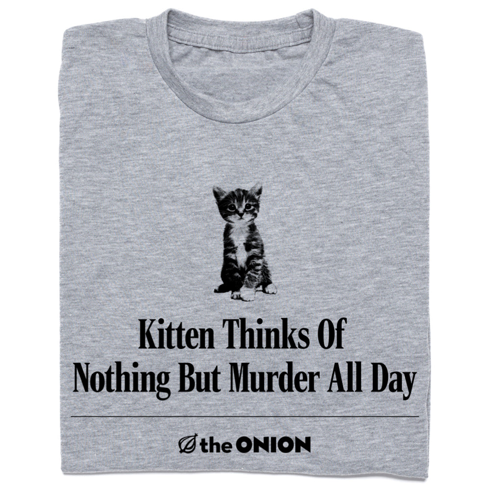 A folded heather gray t-shirt featuring a black graphic of a sitting kitten and the text 'Kitten Thinks Of Nothing But Murder All Day' with the brand logo 'the ONION' at the bottom.