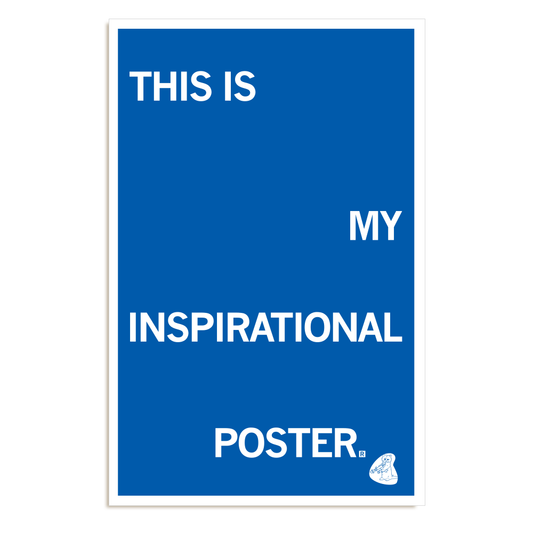 A blue RAYGUN inspirational poster with white text that reads, THIS IS MY INSPIRATIONAL POSTER, and a small illustration of a cartoon animal in the bottom right corner.